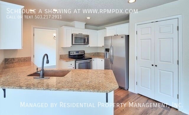Building Photo - 23992 SW Red Fern Dr