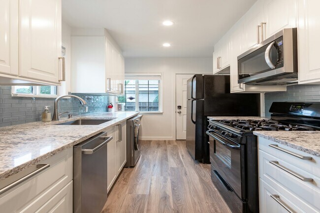 Building Photo - 5058 Colfax Ave