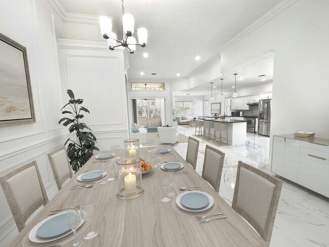 View from the main entrance - includes dining room, living room, kitchen, and family room - 10667 Oak Bend Way