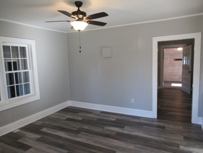 Building Photo - Check out this beautifully renovated white...