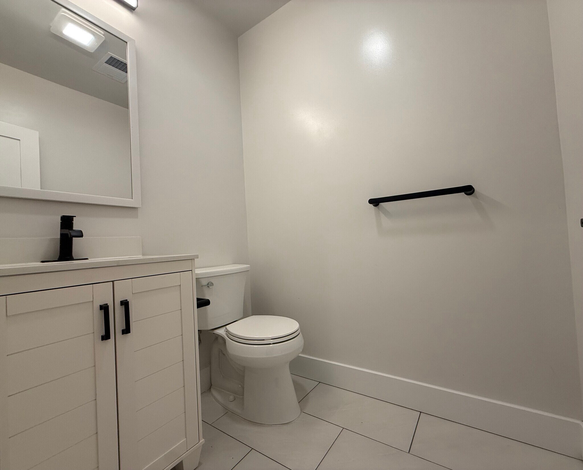1/2 bathroom on 1st floor - 160 Main St