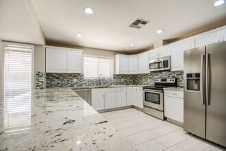 Building Photo - Beautifully remodeled corner 4/2 with pool...