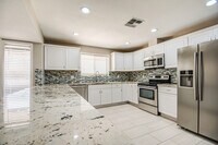 Building Photo - Beautifully remodeled corner 4/2 with pool...
