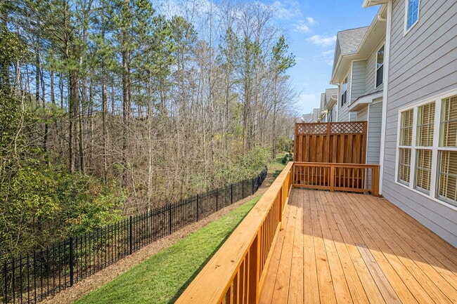 Building Photo - Gated Johns Creek Townhome Offering Space, Privacy, and Everyday Convenience