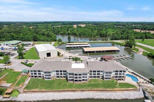 Building Photo - Riverfront Living with Spacious Layout and...