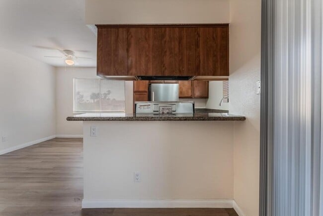 Building Photo - This beautifully renovated 2-bedroom, 2-bath condo is ready for immediate move-in!
