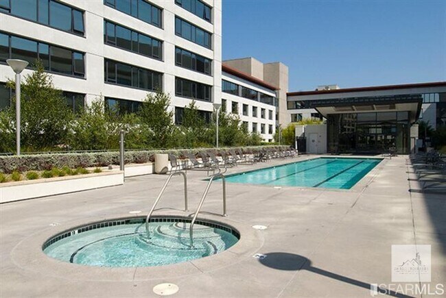 Building Photo - Spacious One-Bedroom Elegance in a Luxury Doorman Building with EV Parking