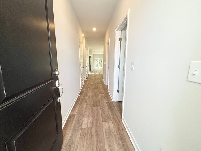 Building Photo - ABSOLUTELY BEAUTIFUL BRAND-NEW BUILD TOWNHOME