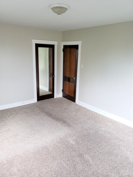 The Large Bedroom #1 offers a full length mirror on the closet door - 201 Richbarn Rd