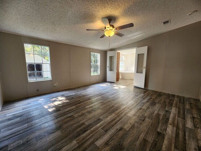 Building Photo - 3 Bed 2 Bath  FENCED land w/ Workshop 3 Miles from WEC!