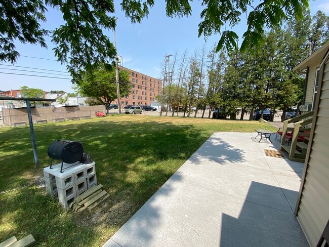 Back yard - patio and grill are for unit 3. - 309 N Davison St