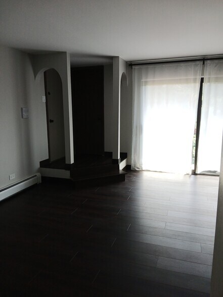 Front entry with coat closet and new sliding door to balcony - 15820 Orlan Brook Dr