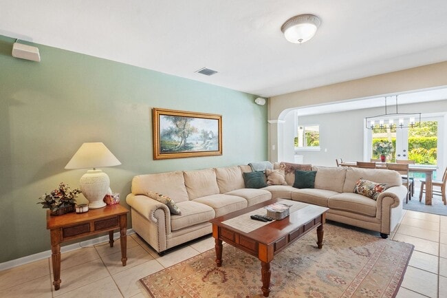 Building Photo - Stunning 4BR/3BA Pool Home with Outdoor Oa...