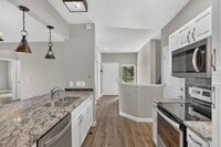 Building Photo - Updated 3BD/3BA Townhome: Quartz Counters, Full Basement Suite/Home Theater, Central A/C