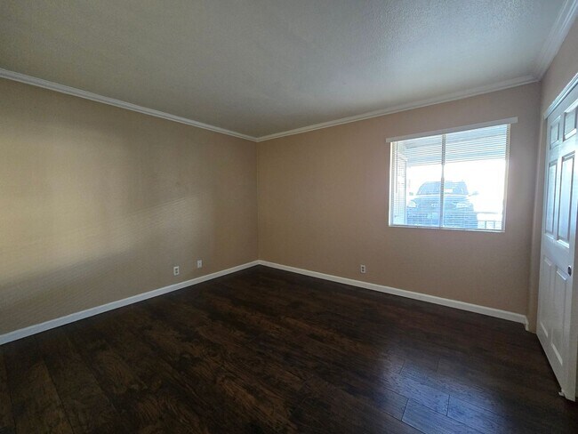 Building Photo - Beautiful 2-Bedroom First-Floor Condo in a Guard-Gated Community