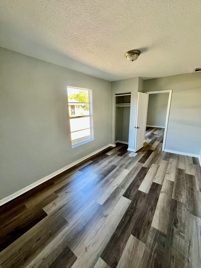 Building Photo - 3BR/1BA with HUGE Backyard, LVT Wood Floor...