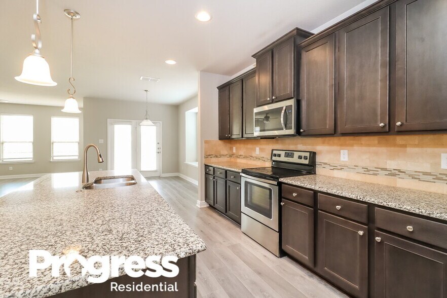 Building Photo - 6232 Topsail Dr