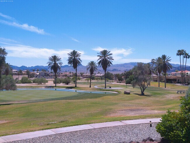 Building Photo - Charming Golf Course Condo for Rent – Residential Estates