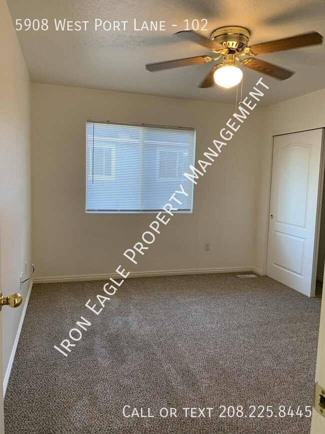 Building Photo - 5908 West Port Lane - 102-