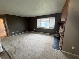Building Photo - 1832 E 75th Ave