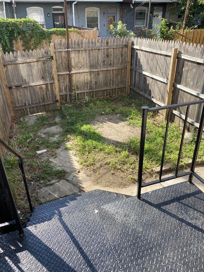 Fenced in back yard - 1319 Herkimer St