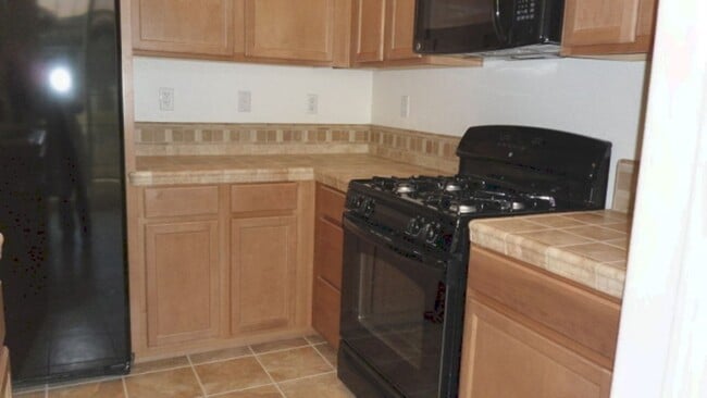 Building Photo - $1,997.00 - Walking Paths - Close to Schools and Shopping - Skiing - Community Pool