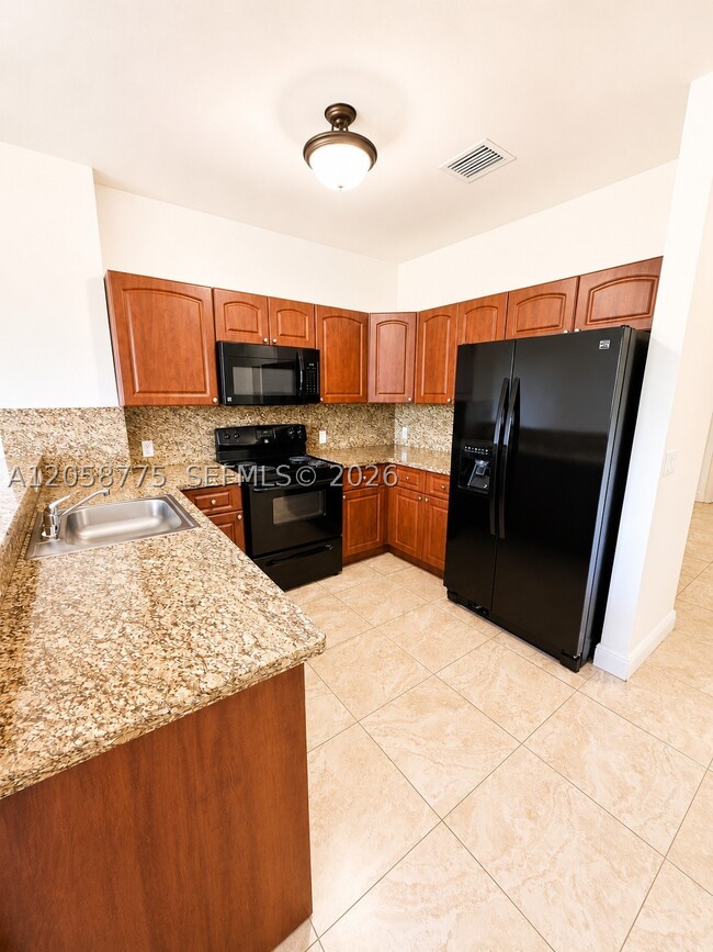 Building Photo - 18120 NW 59th Ave