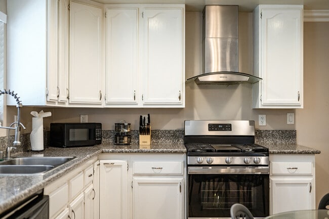 Building Photo - Fully Furnished 2BR Home with Crib — Mid-T...