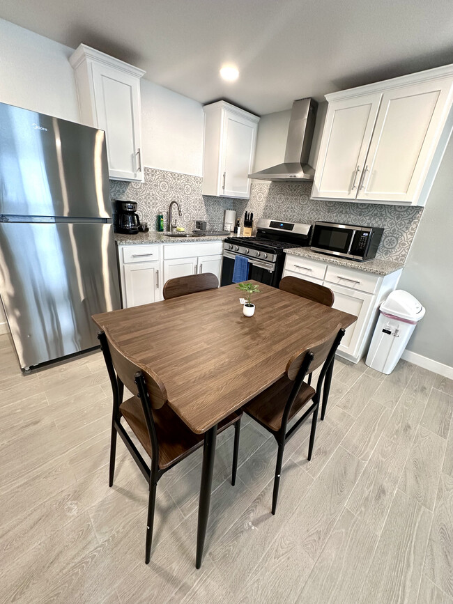 Full Kitchen with Dining Table - 5200 Carousel Dr