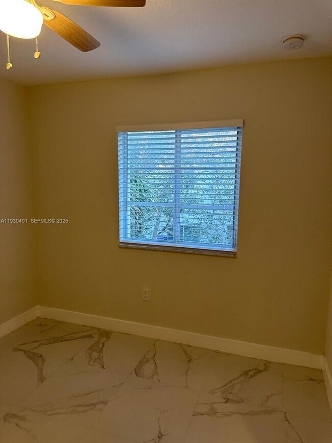 Building Photo - 12421 SW 50th Ct