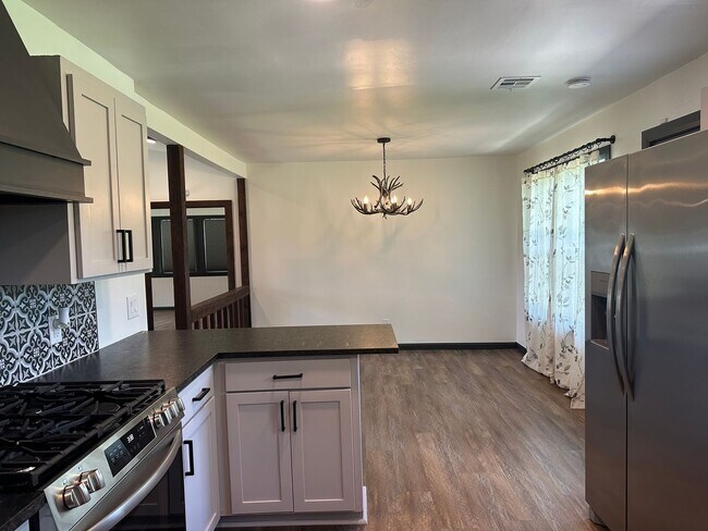 Building Photo - Welcome to country living with a fresh, modern twist.