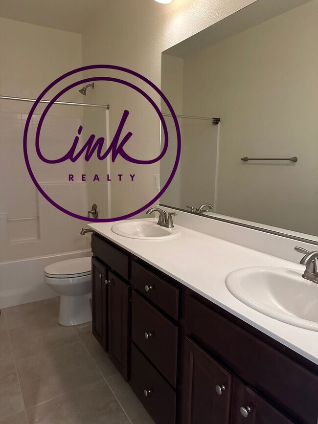 Building Photo - Four Bedroom Single-Family Home