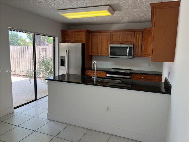 Building Photo - 9105A SW 19th Pl