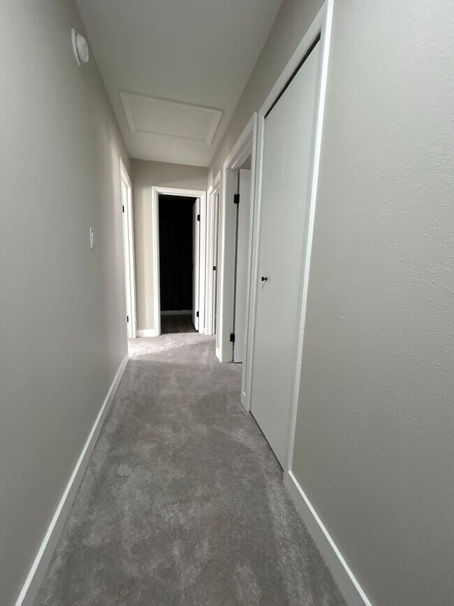 Building Photo - Beautifully Redone 3-Bedroom, 1.5-Bathroom Condo with Attached Garage – $1,725/Month (Lawn Care &...