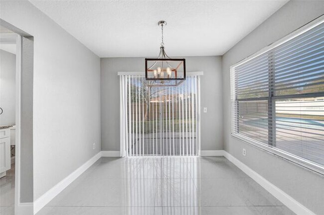 Building Photo - Beautifully Renovated 4/2.5 Pool Home with...