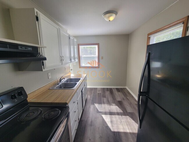 Building Photo - COZY AND AFFORDABLE 2 BR HOME