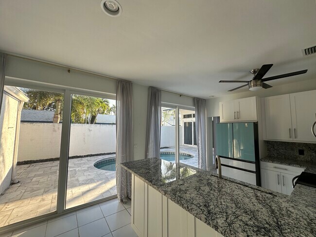 Kitchen view of courtyard - 3656 Mykonos Ct