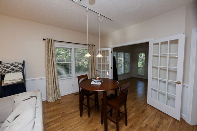 Building Photo - End Unit 3 Bedroom Townhome in Popular Woo...