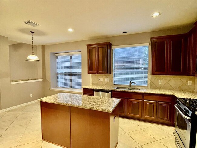 Building Photo - 5527 Custard Apple Trail