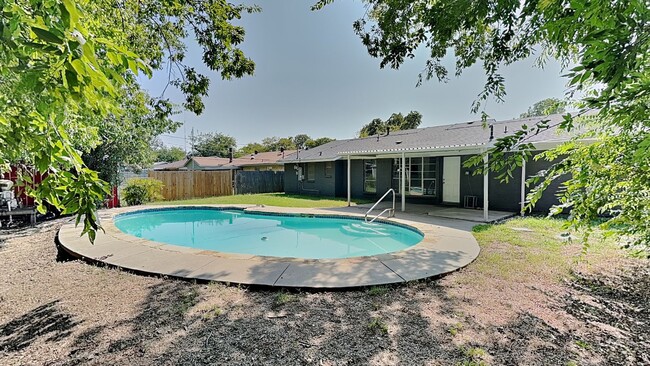 Building Photo - Private Backyard Oasis with Pool in the Heart of Saginaw!