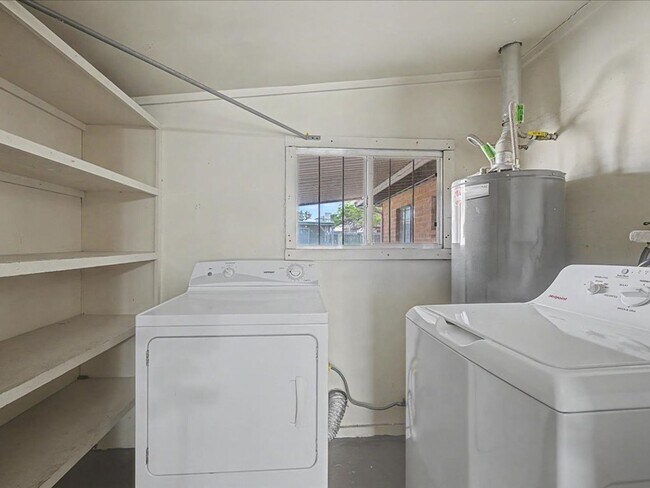 Building Photo - Charming 3-Bedroom Home with Spacious Yard & Versatile Storage!