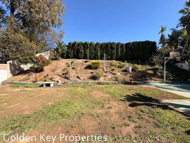 Building Photo - Welcome to this stunning 4-bedroom, 3-bathroom home located in the desirable La Costa neighborhoo...