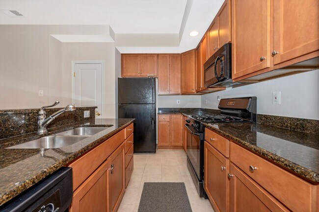 Building Photo - Desirable Two Level Condo For Lease - Not Pet Friendly