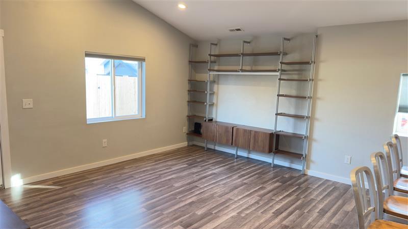 Integrated entertainment stand offers enough space for a 60" TV - 521 Perry St