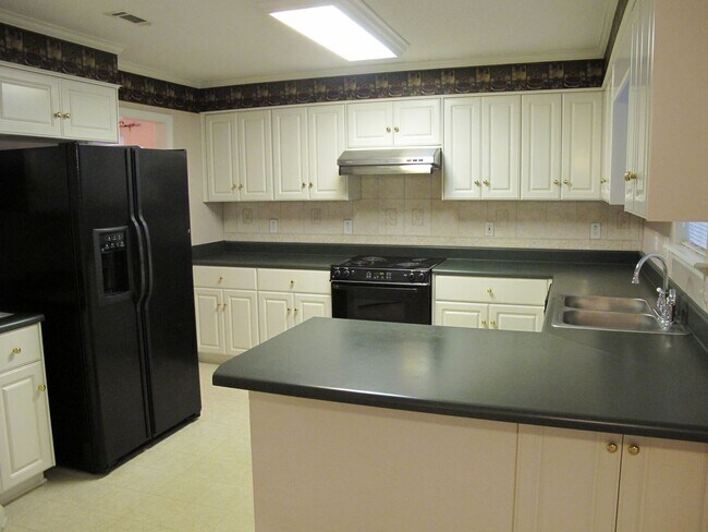 Building Photo - Spacious home in nice Evans neighborhood  ...