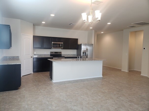 Building Photo - 37698 W Capri Ave