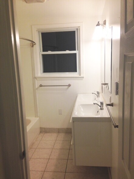 2nd floor bath, double ikea sink w/ 2 drawers, tub/shower, heated tile floor - 1412 Orange Street