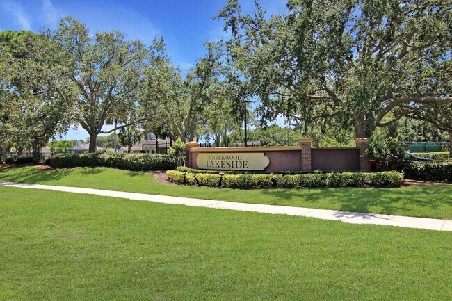 Building Photo - Annual rental: Spacious 3BR/2BA Creekwood Home with Office, Screened Lanai, EV Charger & Resort-S...