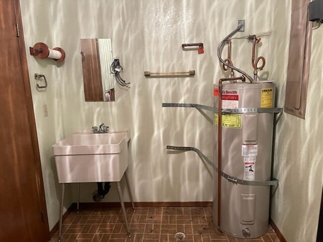 Building Photo - Waterfront! Sunset views! 3 bdrms! Attached garage! Private driveway!