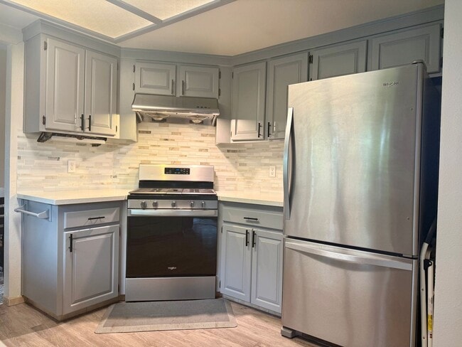 Building Photo - Charming 3 Bedroom Split-Level Home with Multiple Living Rooms & Spacious Back Yard